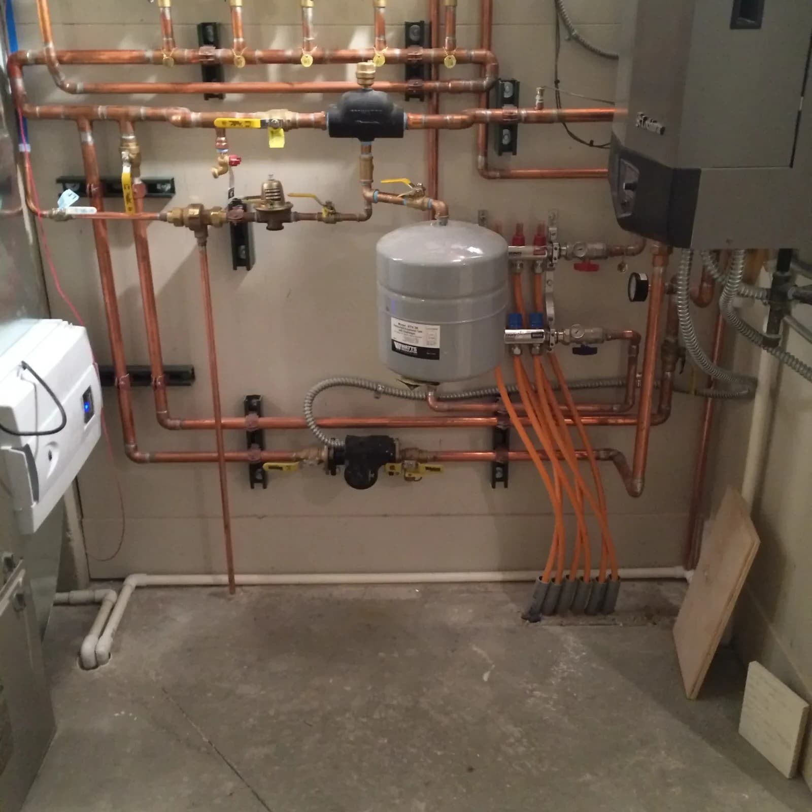 New boiler installation with hydronic piping by Mazure's